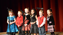 Video: Holy Spirit Catholic School Kindergartners sing Rudolph the Red Nosed Reindeer during the school’s Christmas Program