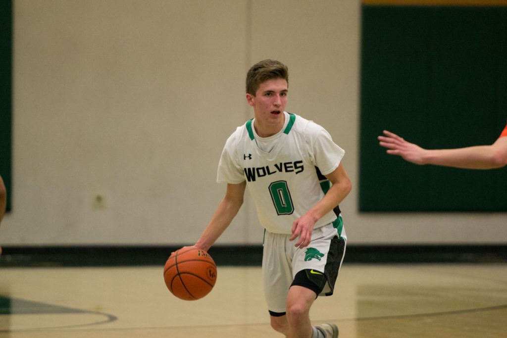 PHOTOS: Wolves Upset by Natrona, 64-61