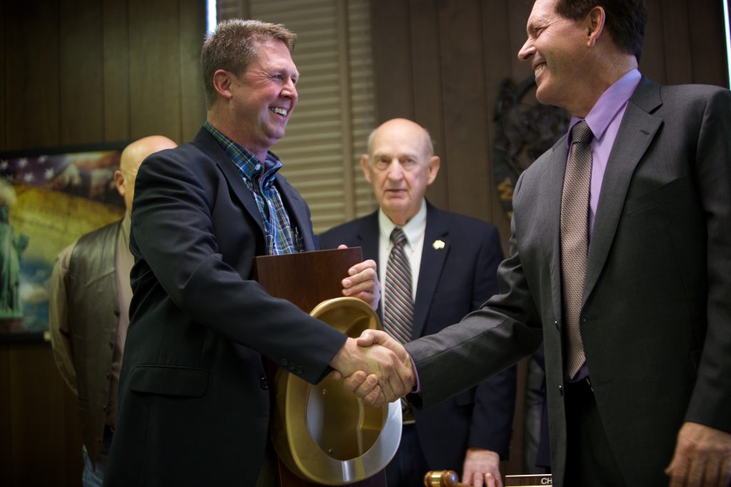 Hospital Trustees Present Golden Bedpan to Commissioners