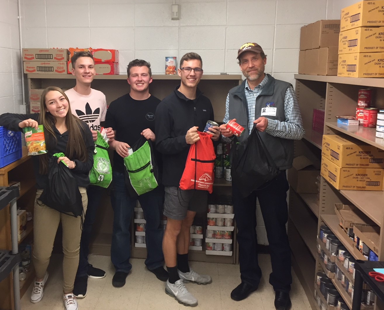 Rotary Provides 320 Meals for Health Academy’s Backpack Program
