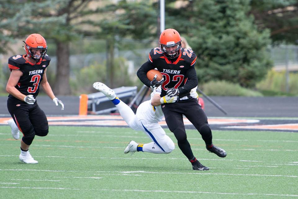 Tigers Secure First Win in Double Overtime
