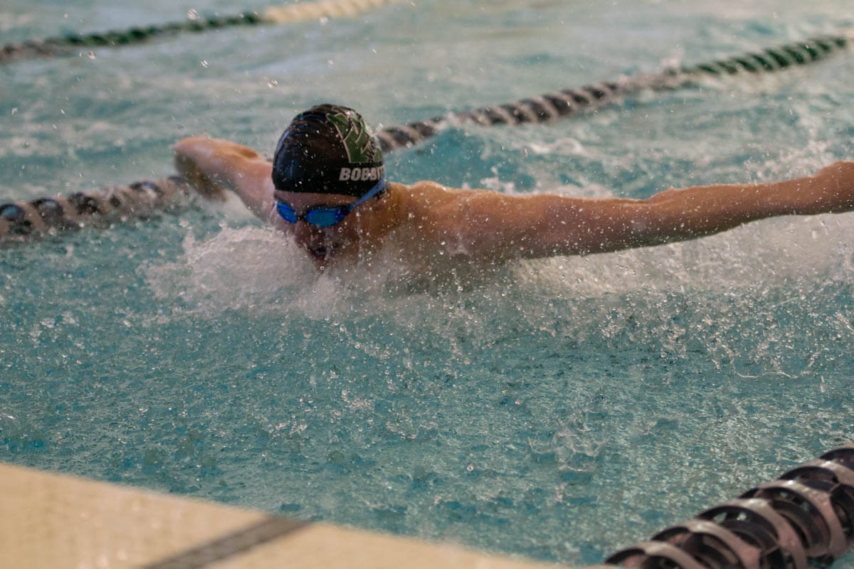 Wolves and Tigers Swim for Last Chance at State