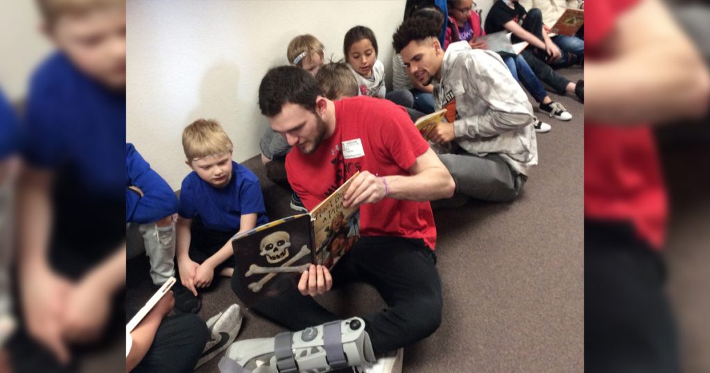 Area Athletes Participate in “Read Across The School” Event