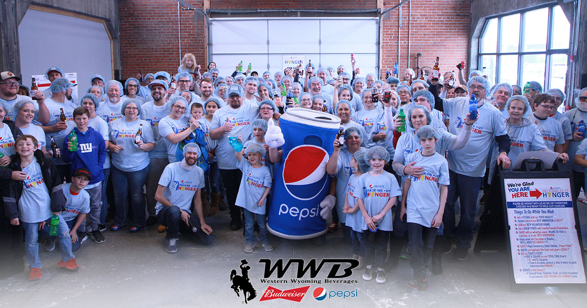 WWB Leads Packing of Over 55K Meals to be Donated to Local Food Banks