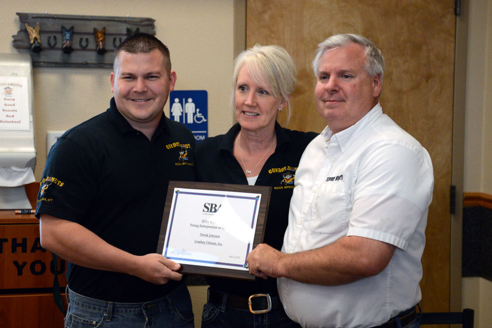 Derek Johnson of Cowboy Donuts receives Wyoming Young Entrepreneur of the Year Award in Wednesday morning ceremony