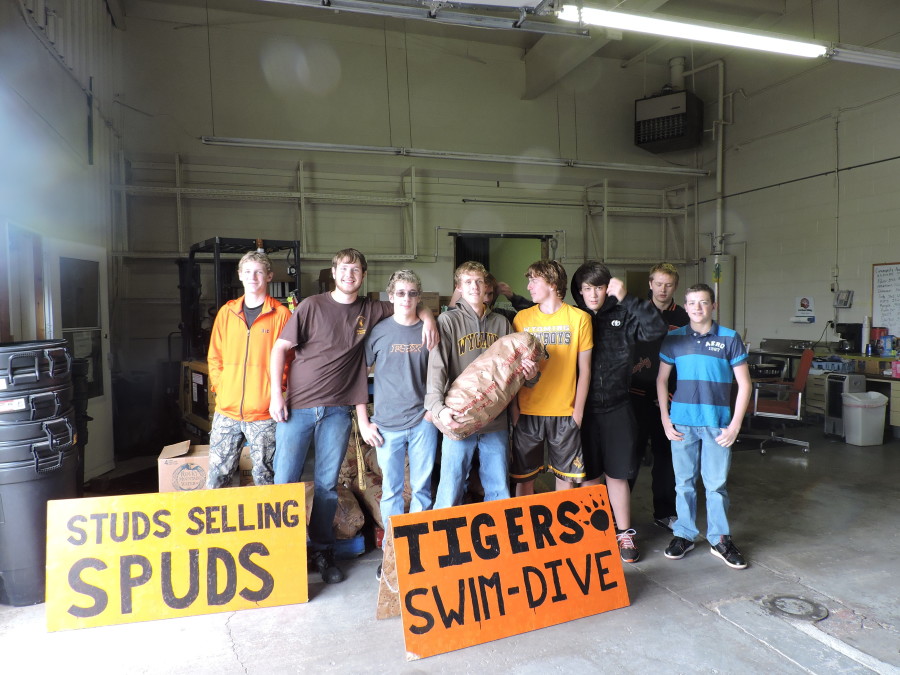 Tigers swim team gives back while preparing for upcoming season