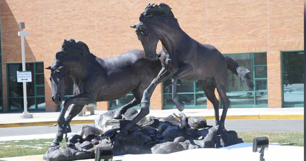 Western Cuts 15 Positions Amid Budget Crisis