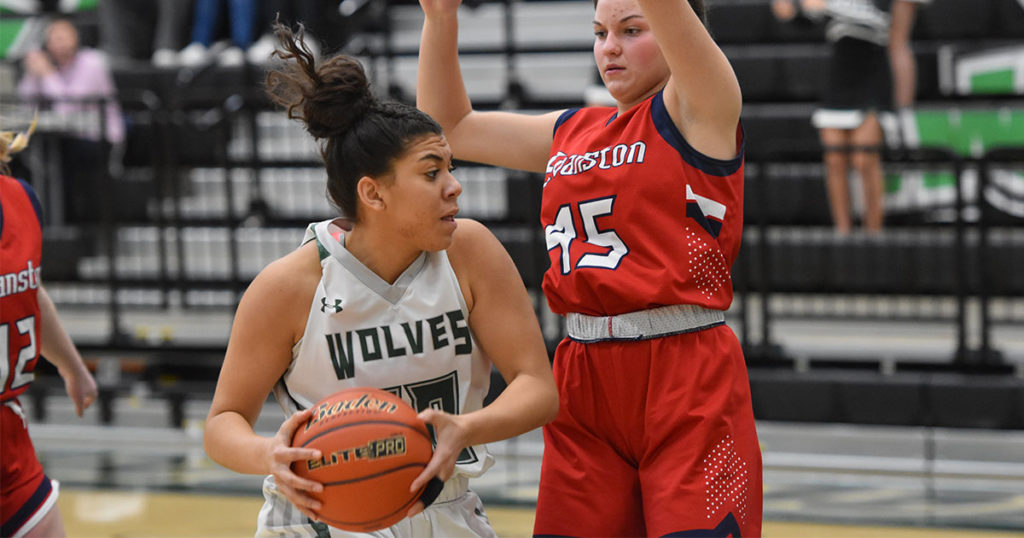 Lady Wolves Beat Evanston; Wolves Fall in Close Game