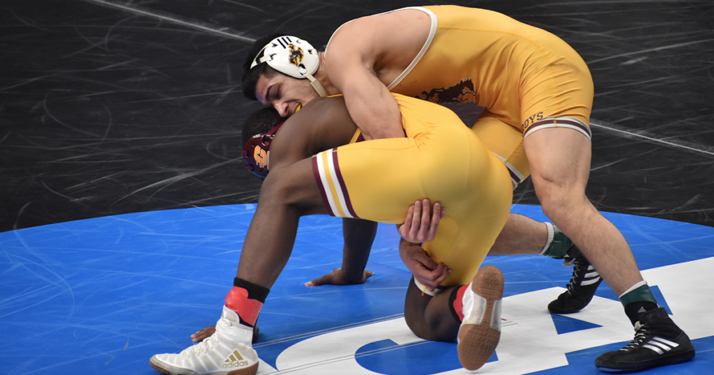 Two Pokes Move on to Quarterfinals in NCAA Wrestling Championships