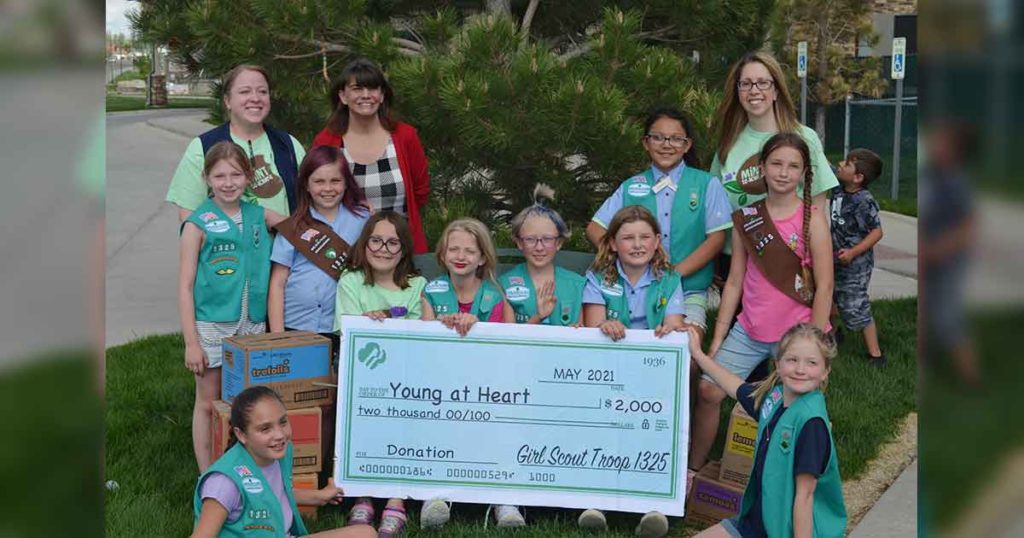 Girl Scouts Give Young at Heart Sizable Donation