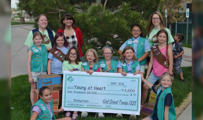 Girl Scouts Give Young at Heart Sizable Donation