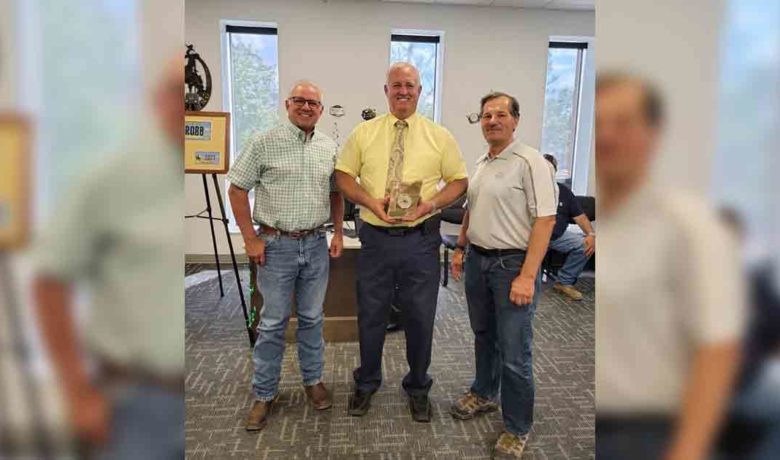 County Treasurer Receives Special Retirement Gift from Trona Mine Representatives