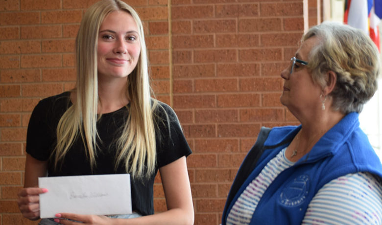 Western Student Emmalee Williams Receives Check from Woman’s Club of Rock Springs