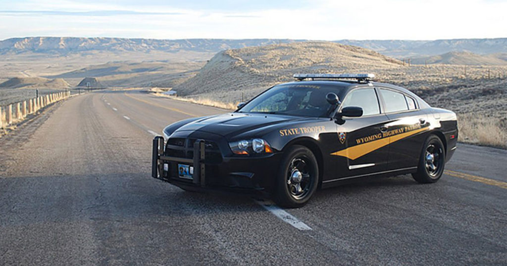 One Life Claimed, One Trooper Injured after Van Collides with Tow Truck