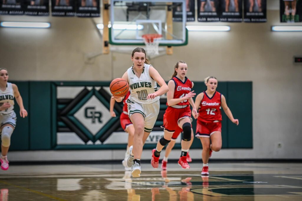 Lady Wolves Dominate Evanston Boys Start Strong but Drop First Conference Game