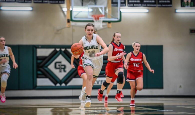 Lady Wolves Dominate Evanston Boys Start Strong but Drop First Conference Game