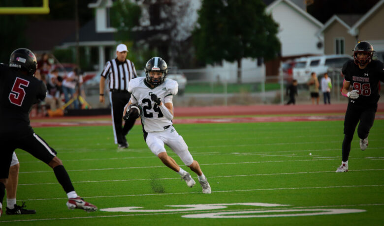 Evanston Defeats Green River 32-7 in Conference Opener