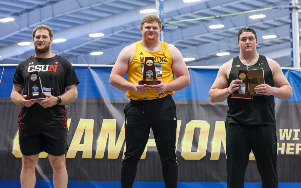 Reynolds Claims National Title, Sets Meet Record in Weight Throw