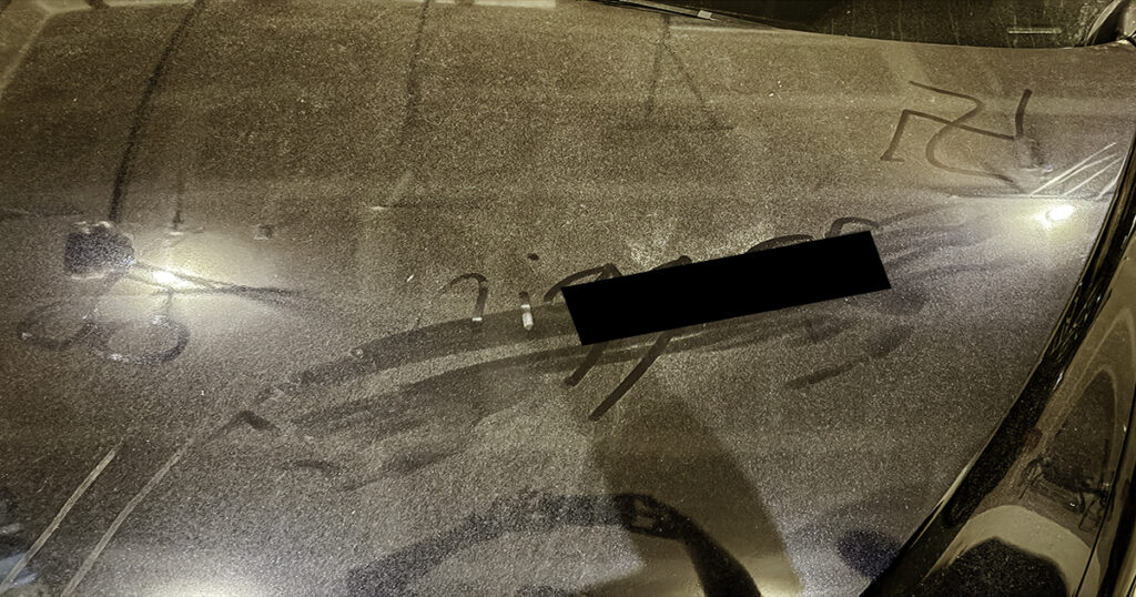 Student’s Car Marked with HATE Symbol and Racial Slur