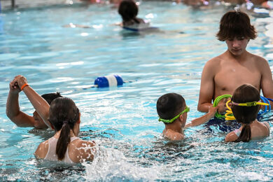 World’s Largest Swimming Lesson Attracts More than 50 in Green River