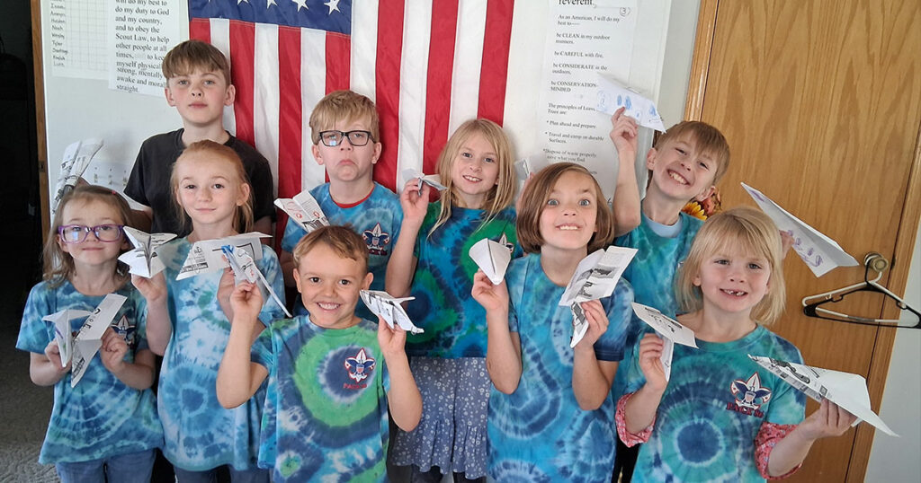 Pack 86 Make Paper Airplanes for Air of the Wolf Adventure