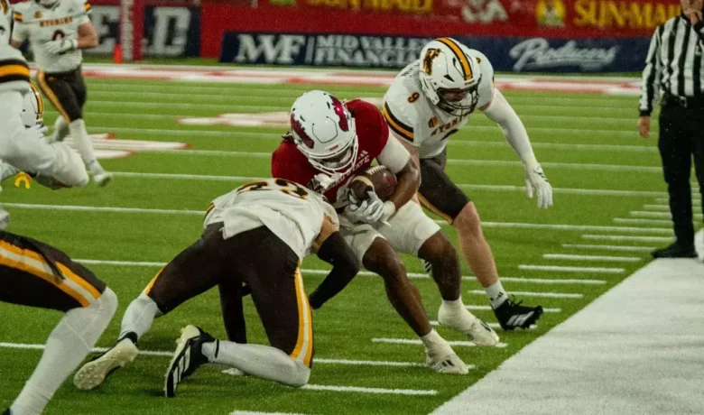 Pokes Struggle on Offense in Rainy 24–3 Loss at Fresno State