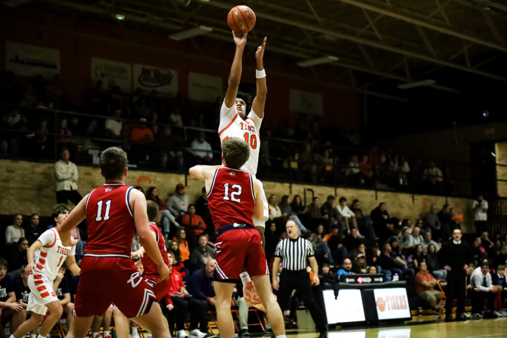 Milestone Night for Wolves and Ivie, Tigers Rally in Evanston Win