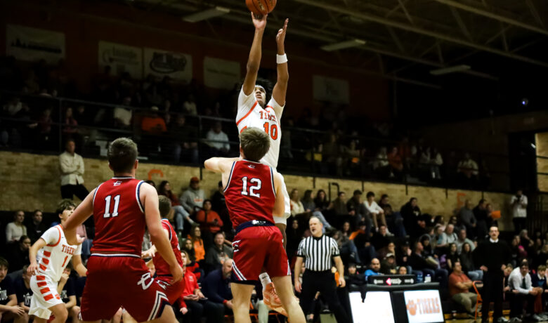 Milestone Night for Wolves and Ivie, Tigers Rally in Evanston Win