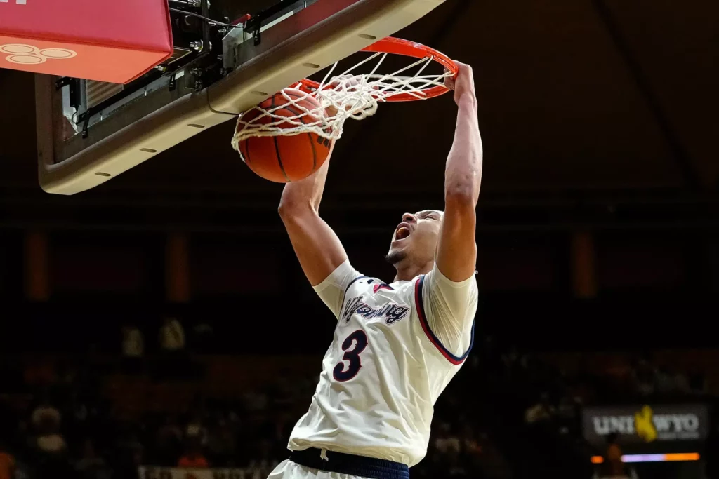 Cowboys Roll Past Rams in Border War, 68-57