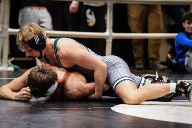 Hintz Reaches Round of 32, Henderson Battles in Consolations at NHSCA Nationals