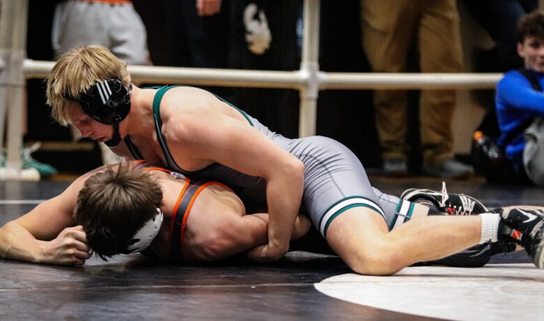 Hintz Reaches Round of 32, Henderson Battles in Consolations at NHSCA Nationals