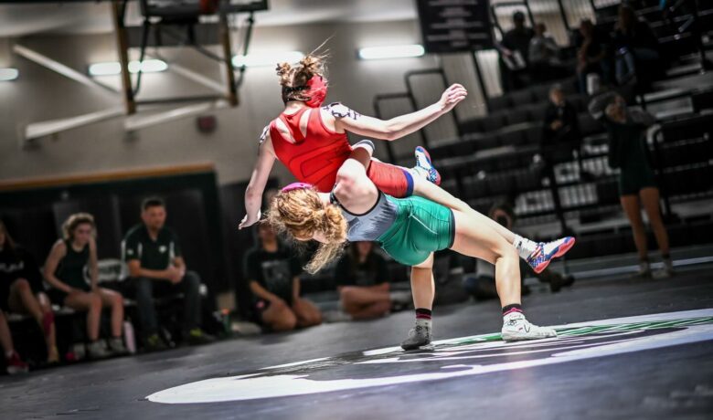 Senior Night Sweep: Wolves Roll Past Evanston, Girls Edge Red Devils in Tight Dual