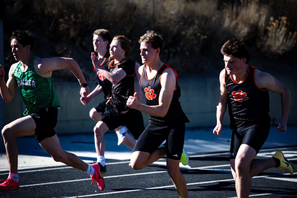 Tigers Dominate at Home, Claim Boys and Girls Titles