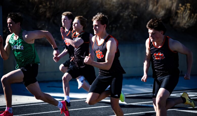 Tigers Dominate at Home, Claim Boys and Girls Titles